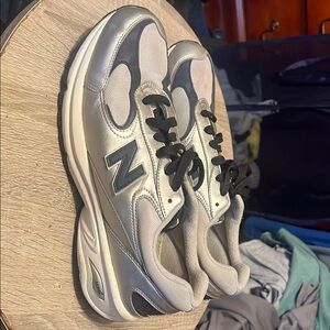 New Balance Silver and White Sneakers